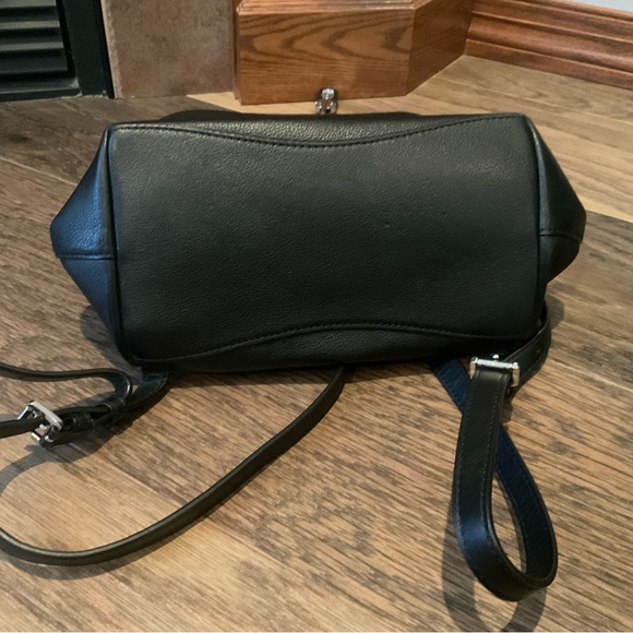 Michael Kors Raven Medium Pebbled Backpack
Black leather with silver hardware - Picture 13 of 13